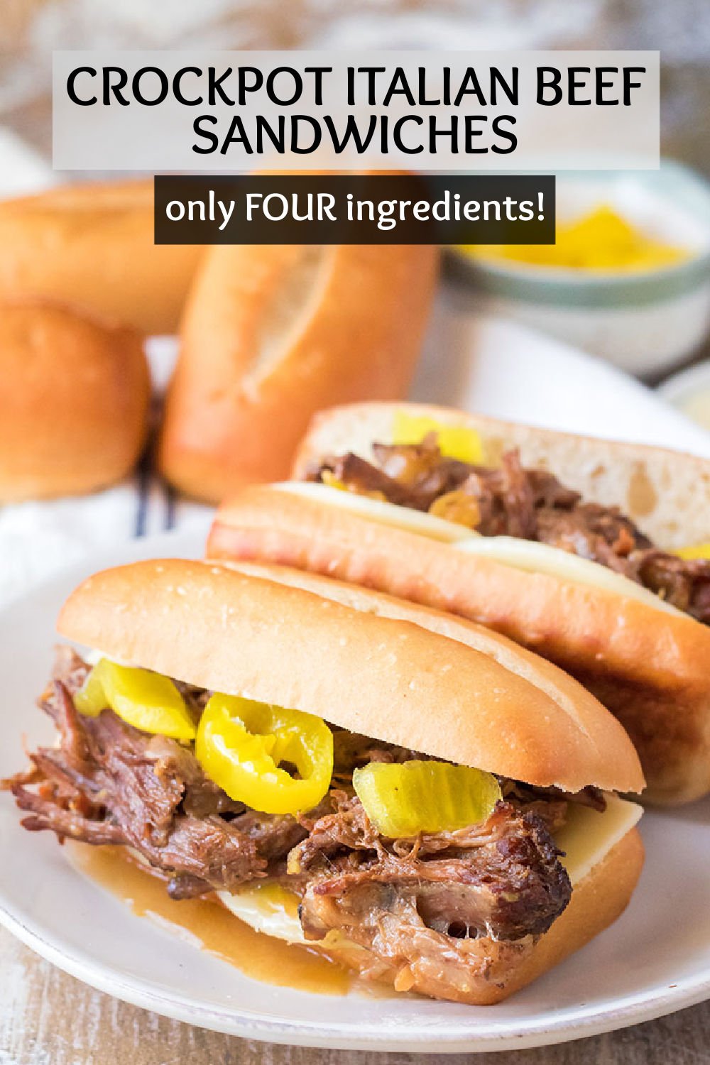 Take five minutes to throw four ingredients into the crockpot to make this Slow Cooker Italian Beef. After a few hours you'll have zesty and filling shredded beef that you can pile onto a crusty bun and top with cheese and peppers for a delicious sandwich. | www.persnicketyplates.com