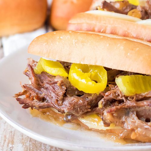Easy, FourIngredient Slow Cooker Italian Beef Sandwiches