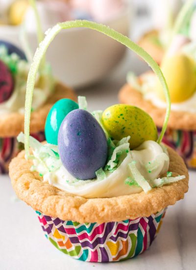 easter basket cookie cup filled with colorful M&Ms.