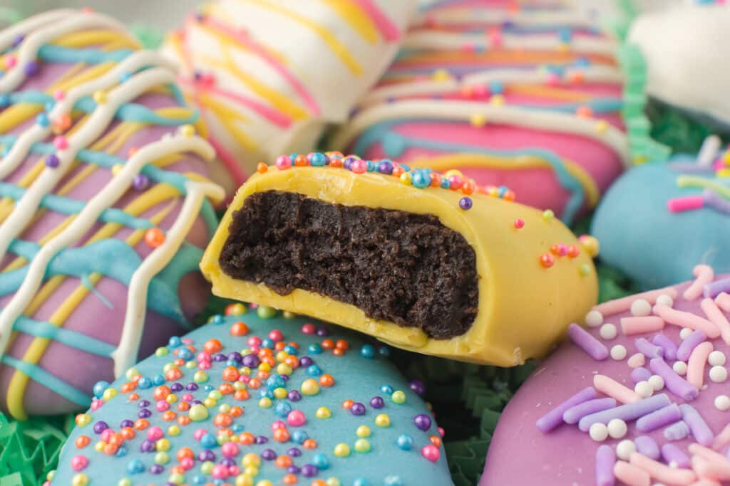 easter egg oreo truffle with a bite missing.