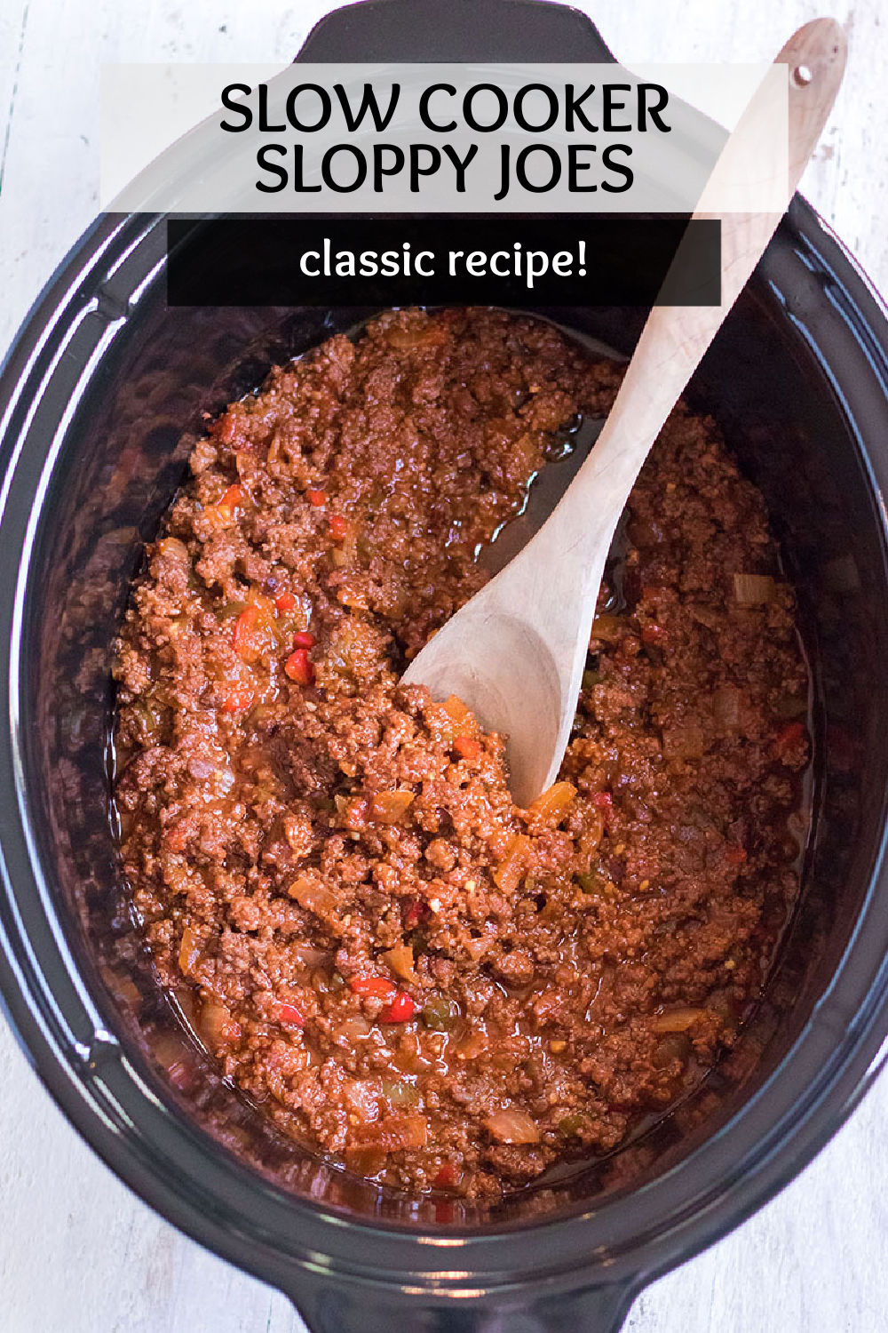 This old fashioned sloppy joes recipe is made extra easy in the slow cooker! The meat mixture slow cooks for hours and then is ready to pile onto a bun. This easy recipe is perfect for the whole family and makes enough for a crowd. | www.persnicketyplates.com