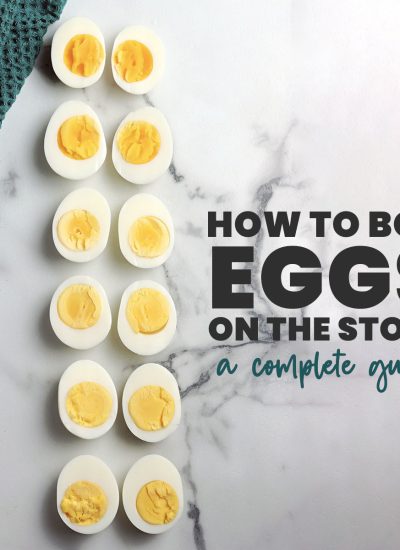 overhead shot of sliced hard boiled eggs reading "how to boil eggs on the stove".
