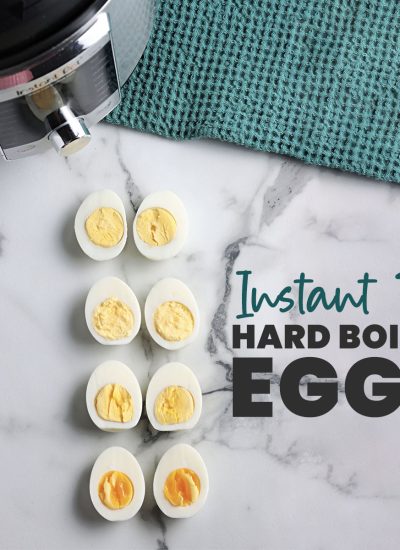 sliced eggs with text overlay reading "instant pot hard boiled eggs".