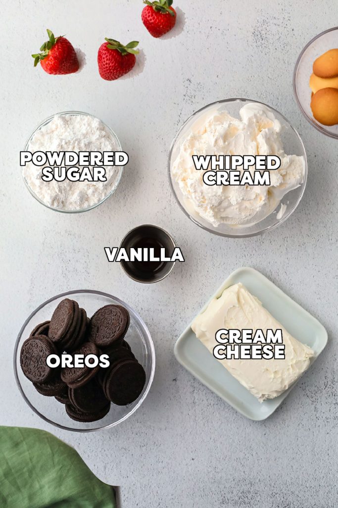 overhead shot of labeled ingredients laid out to make oreo cream cheese dip.