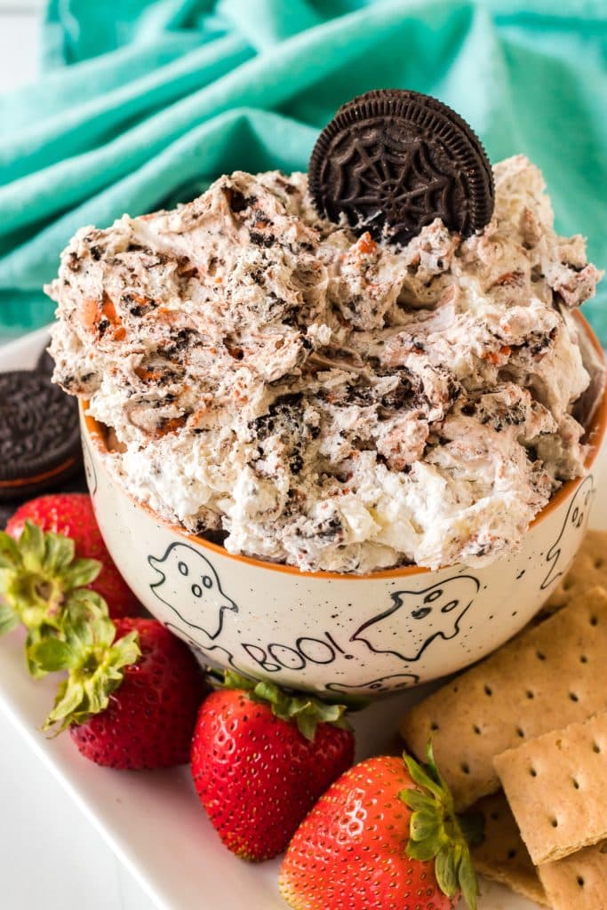 oreo dip with halloween oreos in a ghost dish.