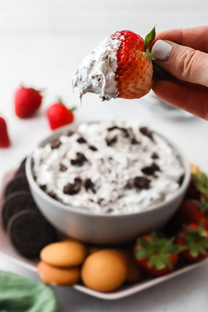 a strawberry dipped in oreo dip.