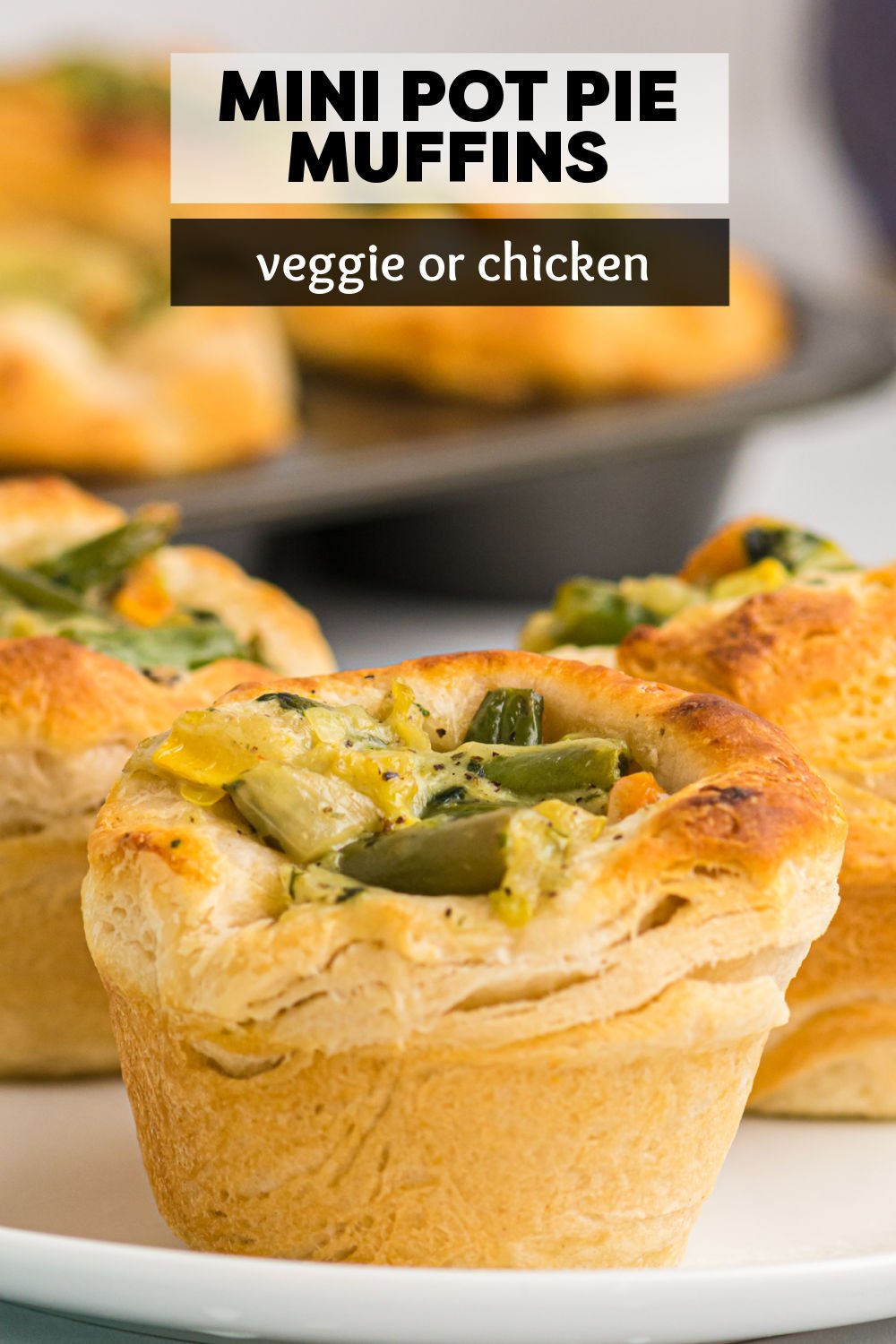 Semi-homemade Mini Pot Pies are a fun and easy way to serve dinner. Canned biscuits are used as the crust and filled with veggies and/or chicken and baked in a muffin tin for handheld comfort food. | www.persnicketyplates.com