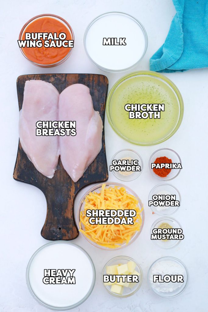 overhead shot of ingredients laid out to make buffalo chicken mac & cheese.