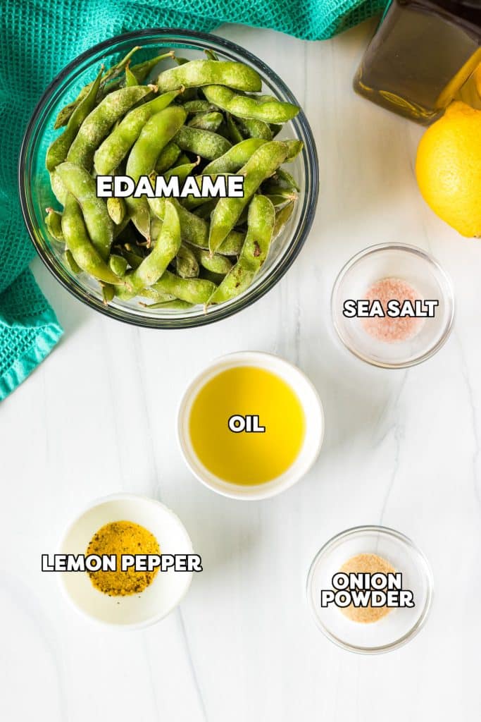 overhead shot of labeled ingredients laid out to make seasoned edamame.