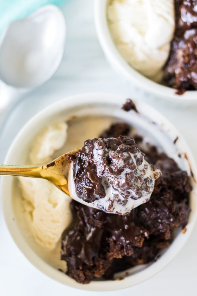 spoon full of chocolate lava cake & vanilla ice cream.