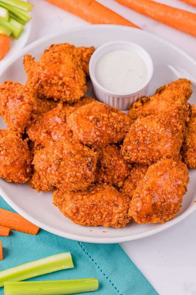 plate of boneless chicken wings with ranch.