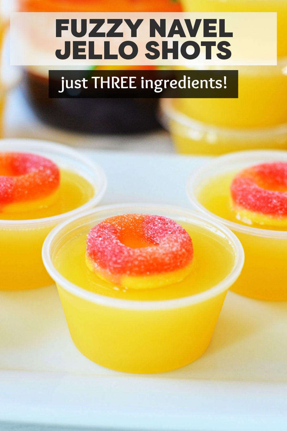 You only need three ingredients and about 10 minutes to make a batch of these easy Fuzzy Navel Jello Shots. Fun for a party! | www.persnicketyplates.com