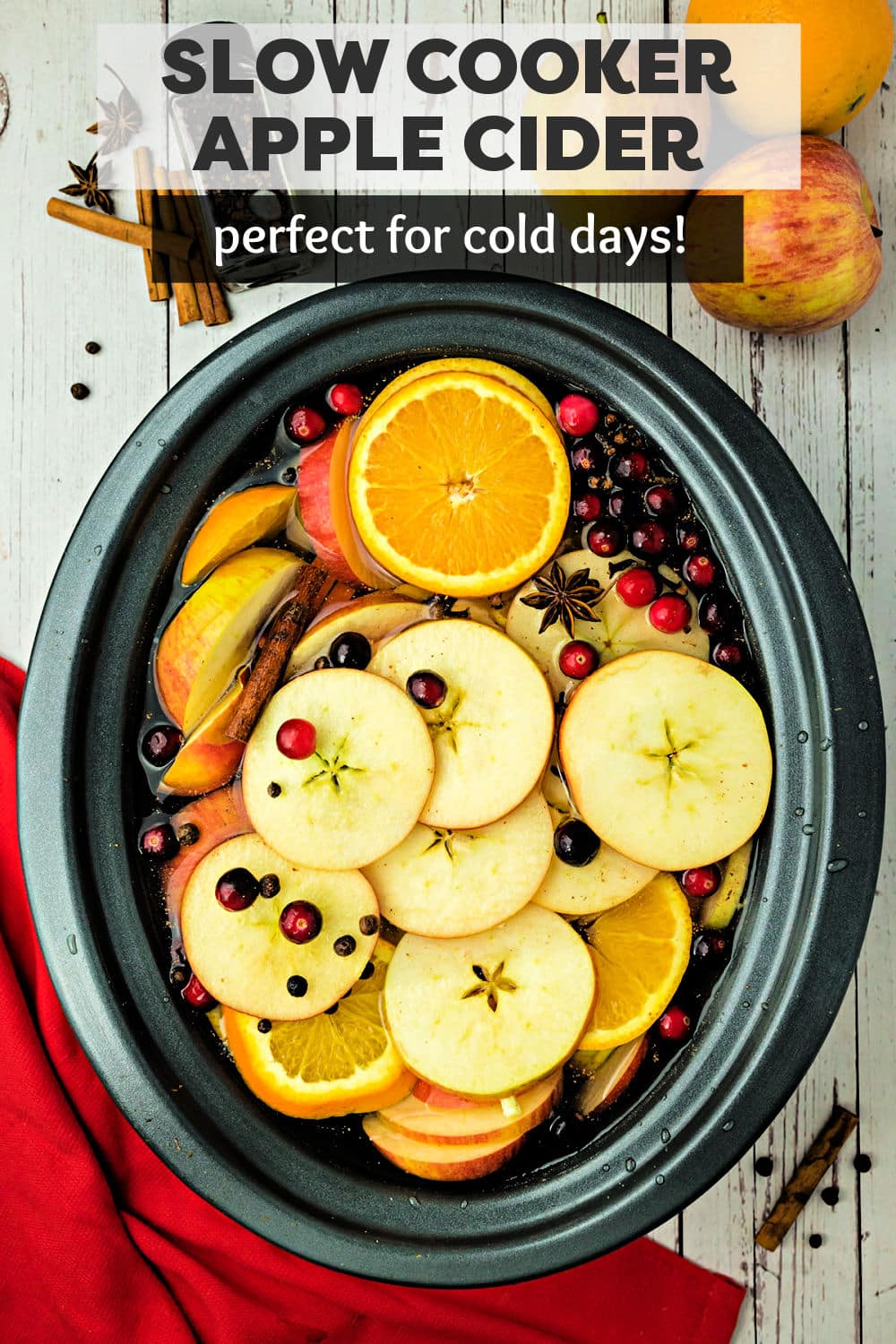 Warm and cozy Slow Cooker Apple Cider is fruity, full of spices, and slow cooked to perfection in the crockpot. Grab a blanket or your favorite sweater and snuggle up with a cup! | www.persnicketyplates.com