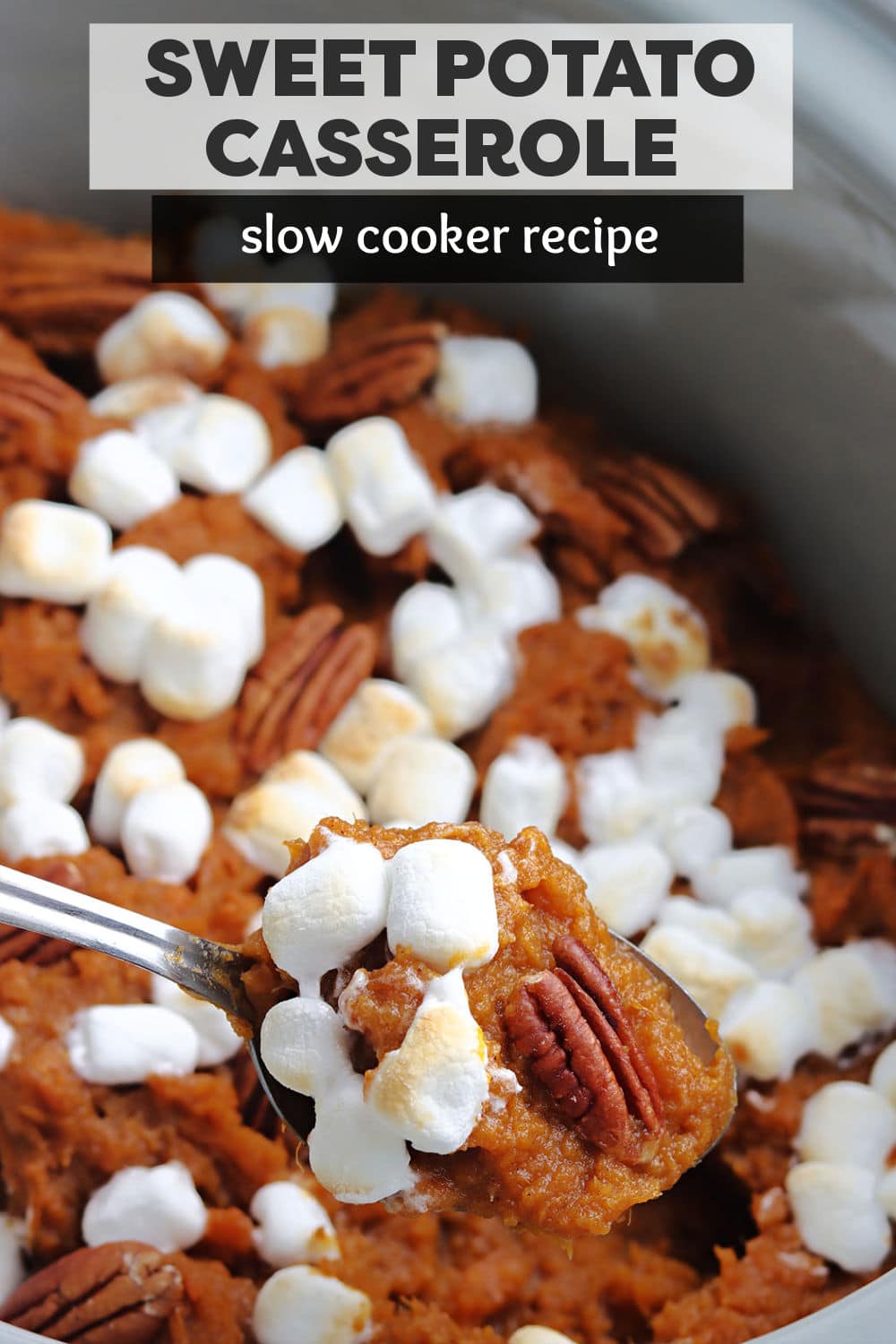 Free up oven space on holidays with this easy Slow Cooker Sweet Potato Casserole. Creamy sweet potatoes topped with a gooey marshmallow topping and pecans made right in the crockpot! | www.persnicketyplates.com