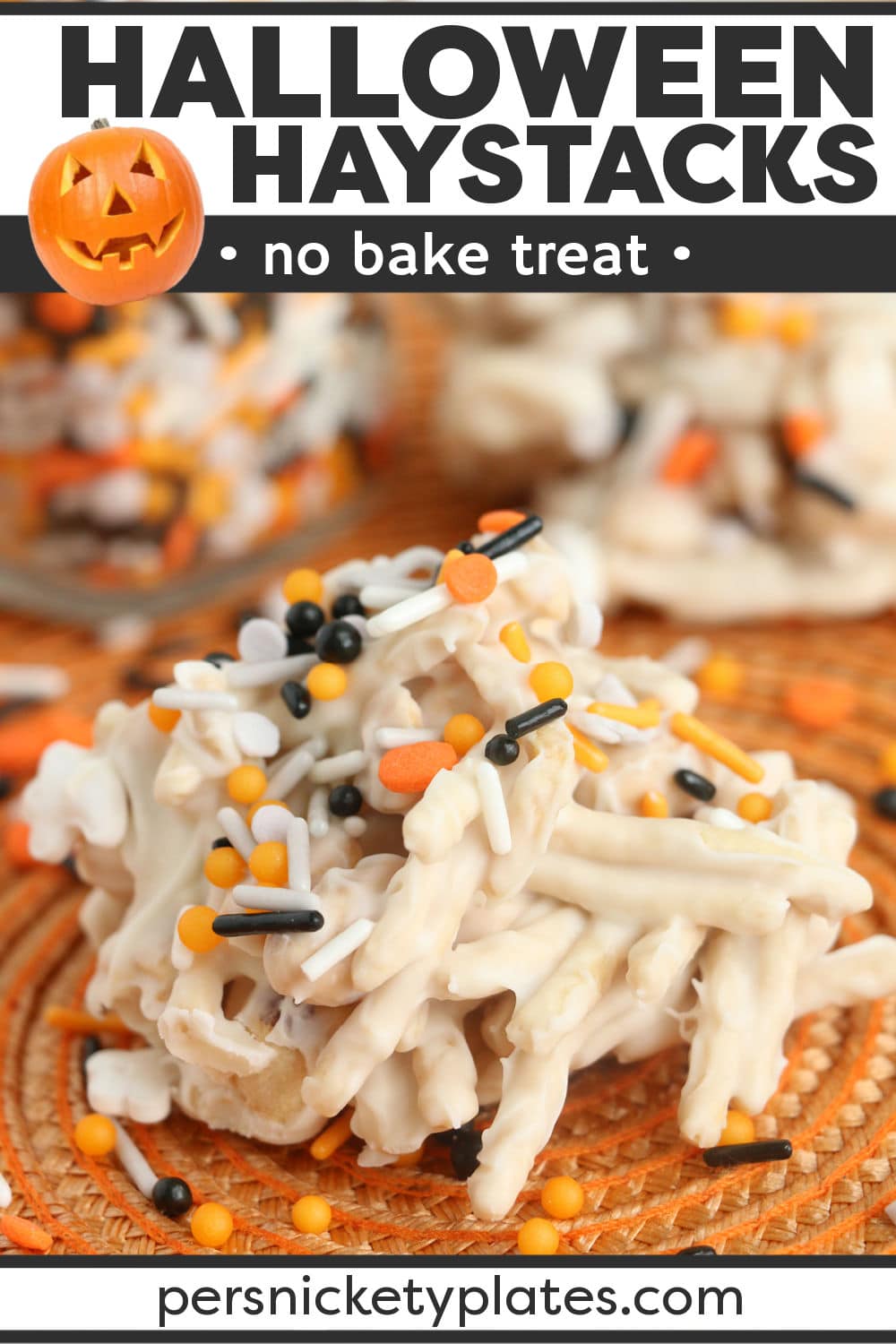 These Crockpot Halloween Haystacks are made with just four ingredients and are the perfect blend of salty and sweet. Made easy with the help of your slow cooker, these white chocolate candy haystacks with Halloween sprinkles are perfect for your next spooky party. | www.persnicketyplates.com