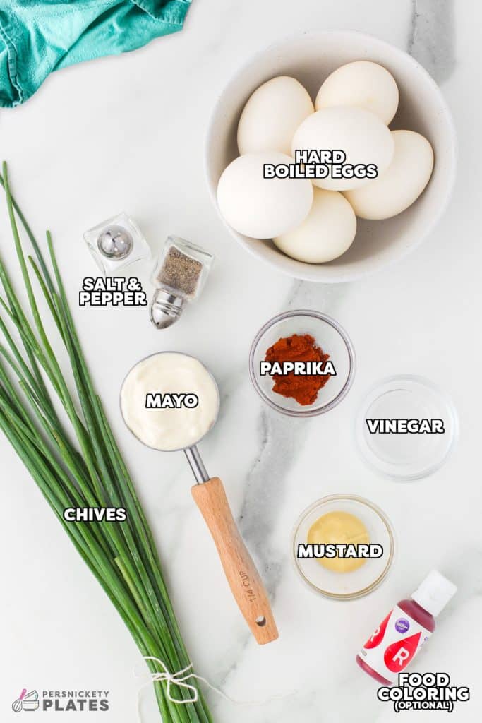 overhead shot of labeled ingredients laid out to make deviled eggs.