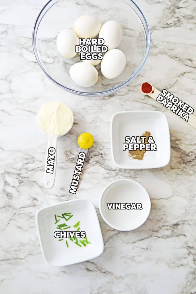 overhead shot of labeled ingredients for deviled eggs.