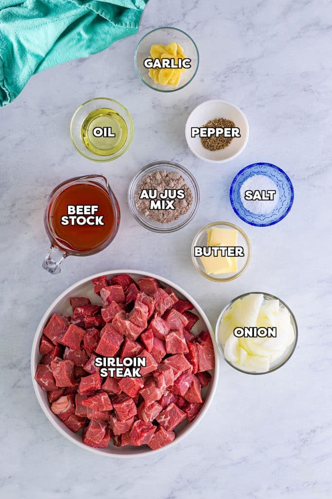 overhead shot of labeled ingredients laid out to make slow cooker steak bites.