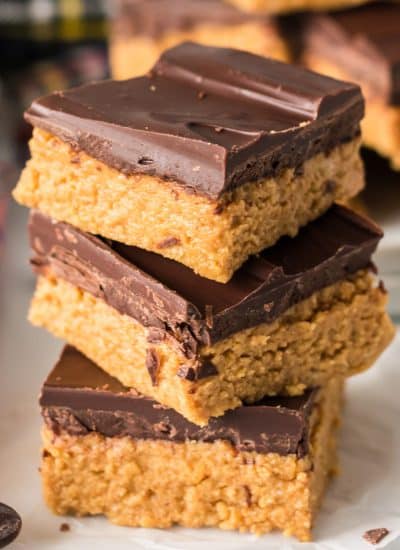 stack of 3 chocolate peanut butter bars.