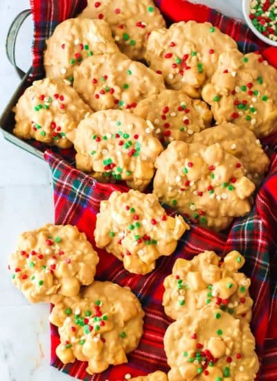 avalanche cookies with christmas sprinkles in a box.