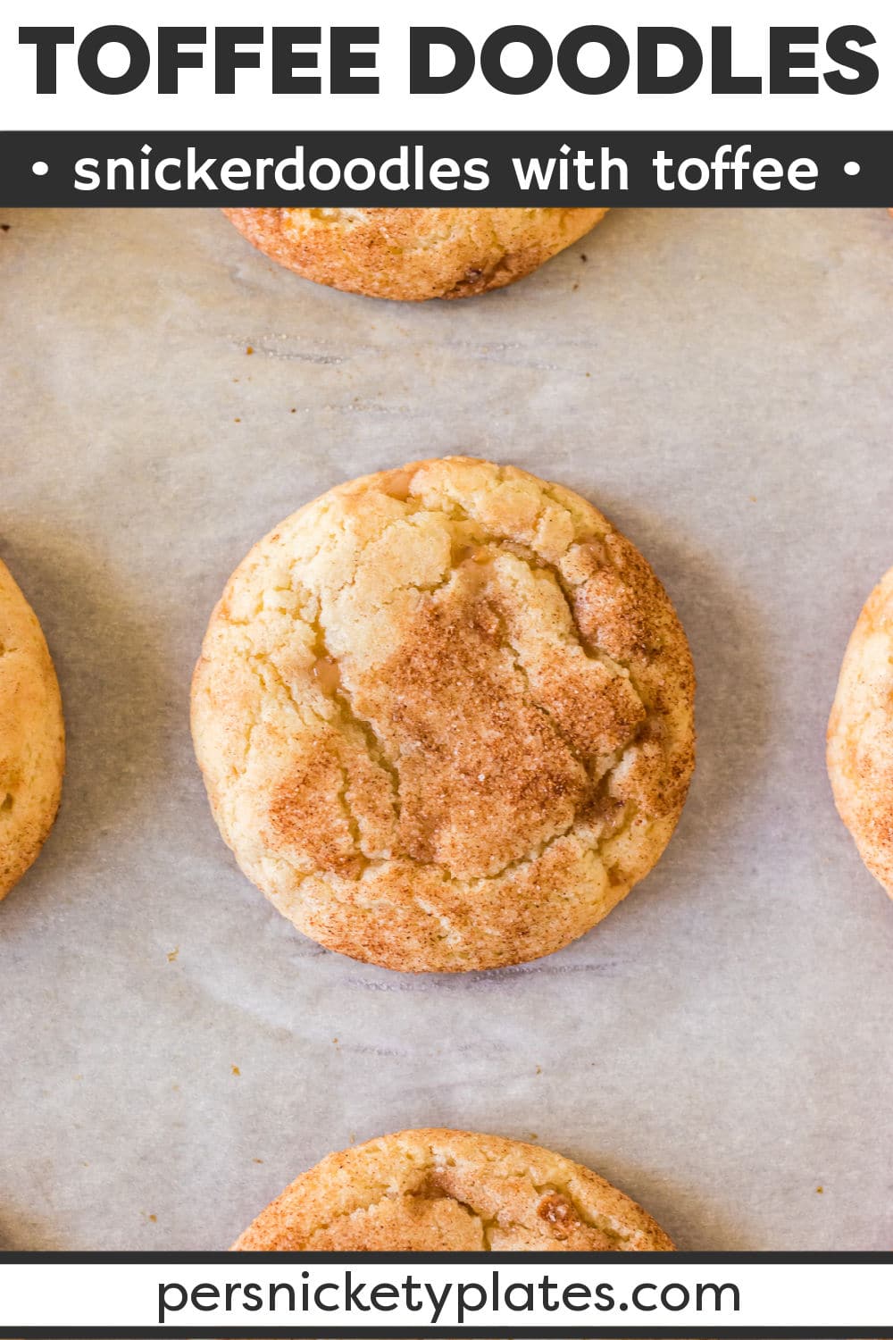 This easy Toffee Doodle cookie recipe takes everything you love about snickerdoodles up a notch by filling them with toffee bits! They are soft, chewy, and rolled in just the right amount of cinnamon and sugar. | www.persnicketyplates.com