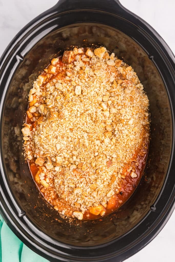 breadcrumbs sprinkled in a crockpot over chicken.