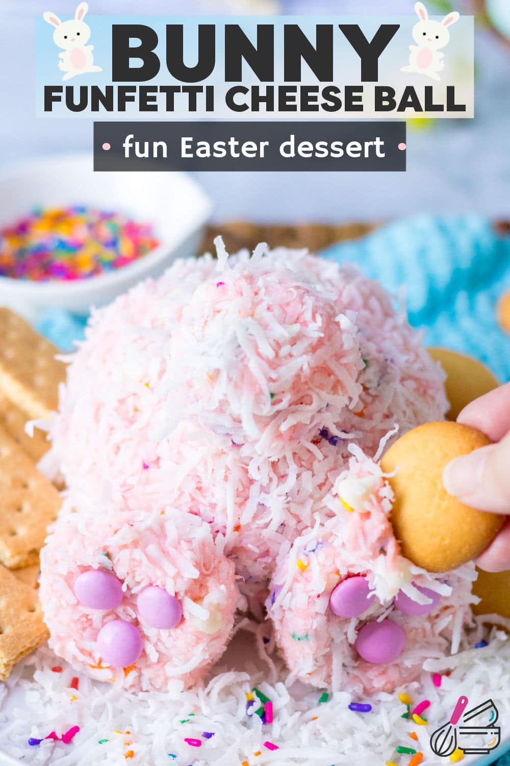 This adorable Bunny Butt Strawberry Funfetti Dip is made with cream cheese and strawberry cake mix which makes it perfect for dipping cookies.  A quick coat of shredded coconut gives this bunny his fur.  This Easter Bunny Dessert Cheese Ball is going to be the cutest dessert on your Easter table! | www.persnicketyplates.com