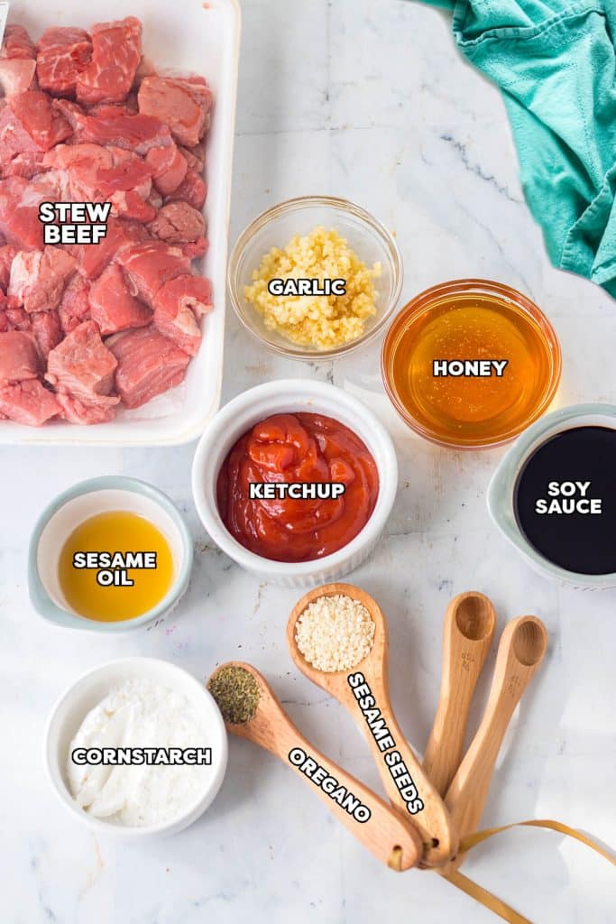 overhead shot of labeled ingredients laid out to make honey garlic steak bites.
