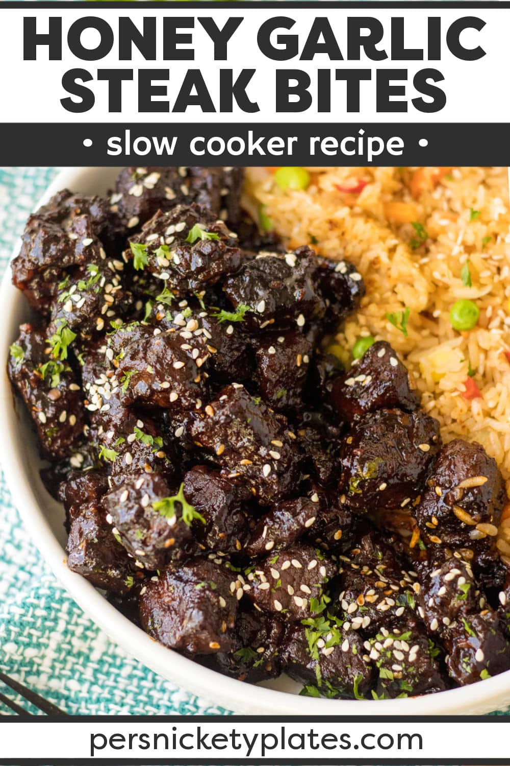 Slow cooker honey garlic steak bites are an easy way to make an impressive meal everyone will love. Seared steak bites are cooked low and slow in the crockpot in a quick honey garlic sauce until fall-apart tender and full of flavor. Served over rice or noodles for a comforting meal or on a mini skewer for a game day appetizer! | www.persnicketyplates.com