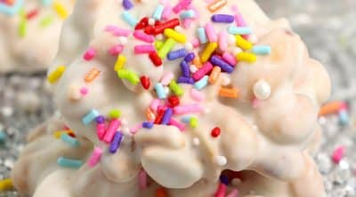 white chocolate crockpot candy with rainbow sprinkles.