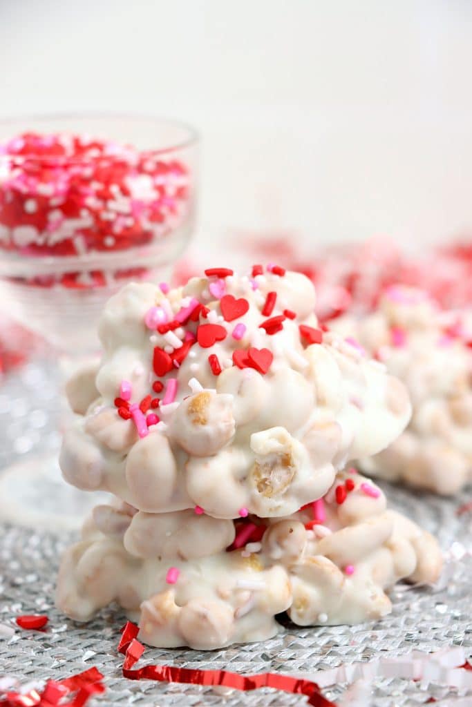 white chocolate crockpot candy with valentine's day sprinkles.