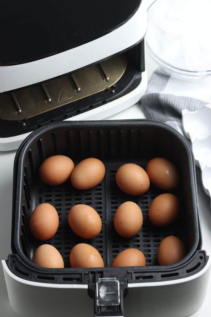 eggs in an air fryer basket.