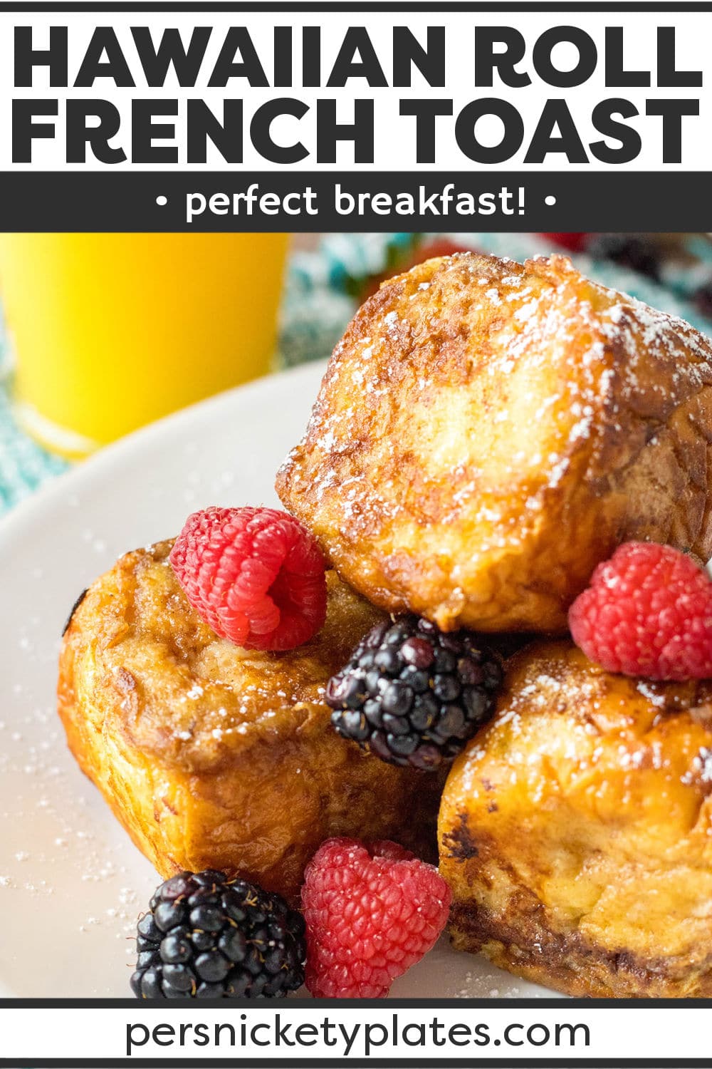 Hawaiian Rolls French Toast is made by soaking sweet hawaiian bread in an egg mixture and then cooking it up until golden brown on all sides. Sprinkled with powdered sugar and paired with fresh berries before serving, this easy breakfast recipe is perfect for brunch, the weekend, or special occasions. | www.persnicketyplates.com