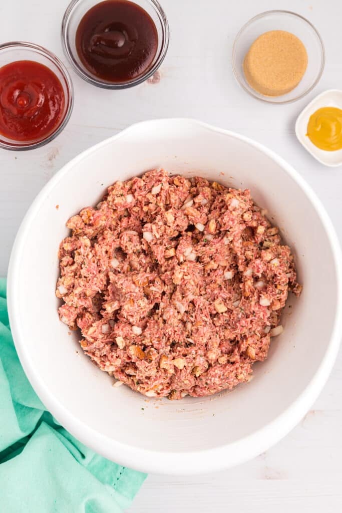 overhead shot of meatloaf mixture in a mixing bowl.