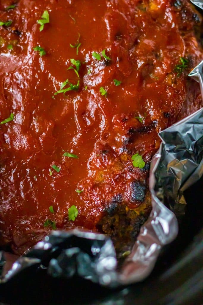 closeup of meatloaf in a slow cooker.