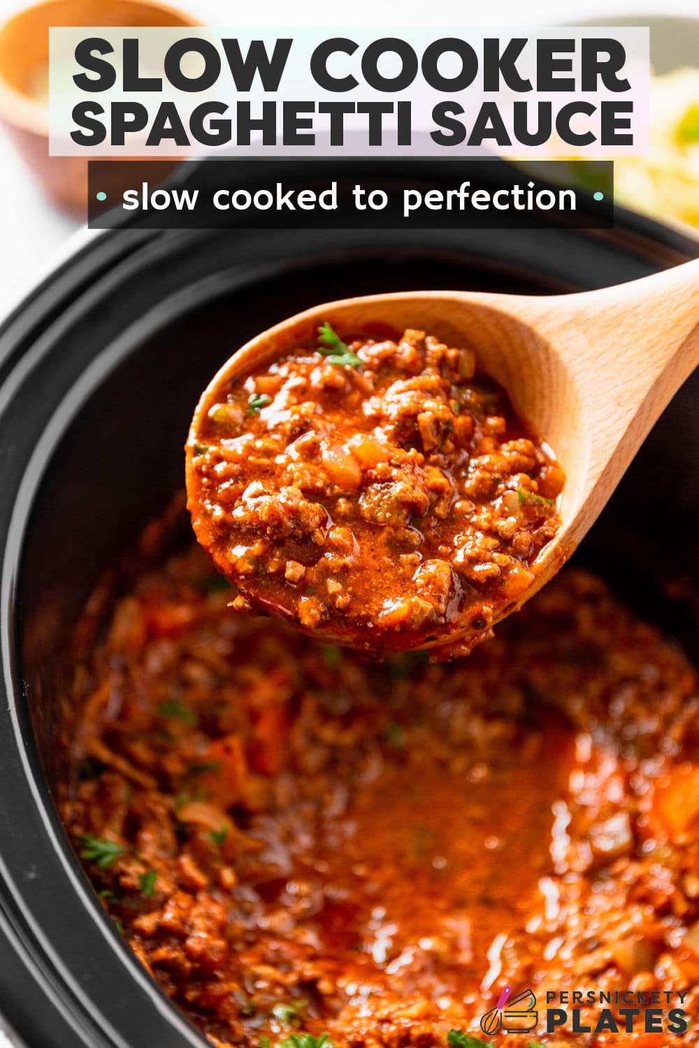 This family favorite slow cooker spaghetti sauce is made with simple ingredients and without the need to watch over a simmering pot. The slow-cooked beef and veggies makes a thick and rich sauce that is perfect over your favorite pasta noodles! | www.persnicketyplates.com