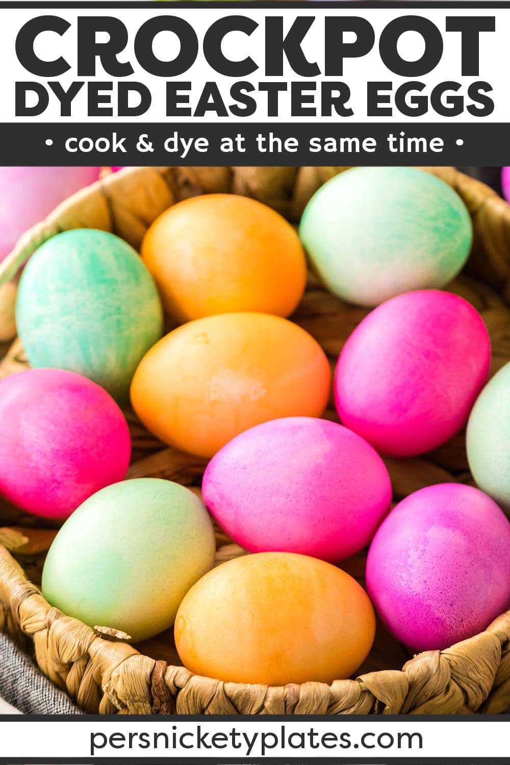 Slow cooker dyed Easter eggs are an efficient way to dye a large batch in a variety of colors at once, all while they are being hard-boiled to perfection! Grab some eggs, water, food coloring, and your crockpot and you're on your way to a batch of beautifully vibrant Easter eggs ready to eat or use as a table centerpiece. All without dye ever touching your hands! | www.persnicketyplates.com