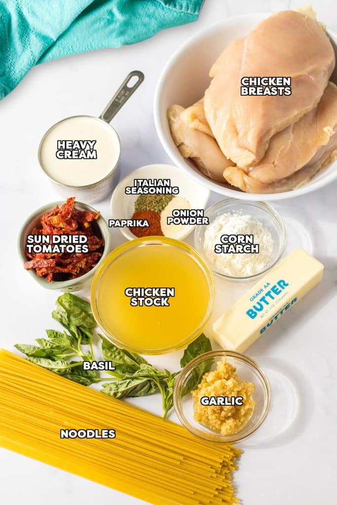 overhead shot of labeled ingredients laid out to make marry me chicken.