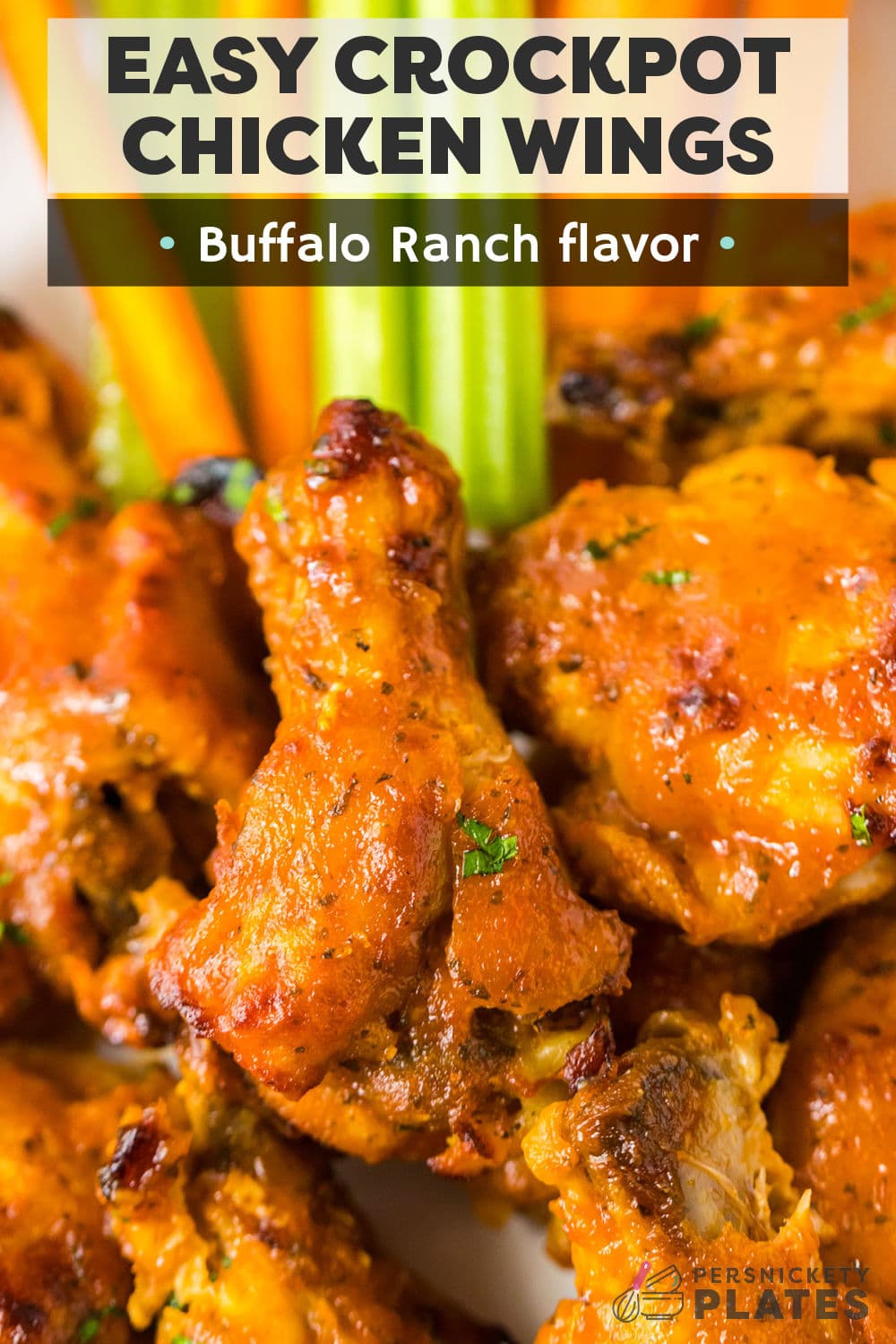 Buffalo ranch crockpot chicken wings combine buffalo sauce and ranch into one utterly delicious flavor combination. Smothered in a tangy, spicy, zesty sauce, the wings are slow cooked until the meat falls off the bones then made crispy and caramelized under the broiler! | www.persnicketyplates.com