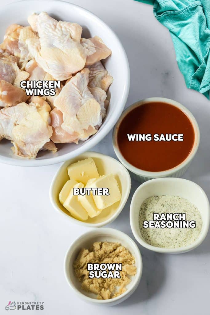 overhead shot of labeled ingredients to make buffalo ranch chicken wings.