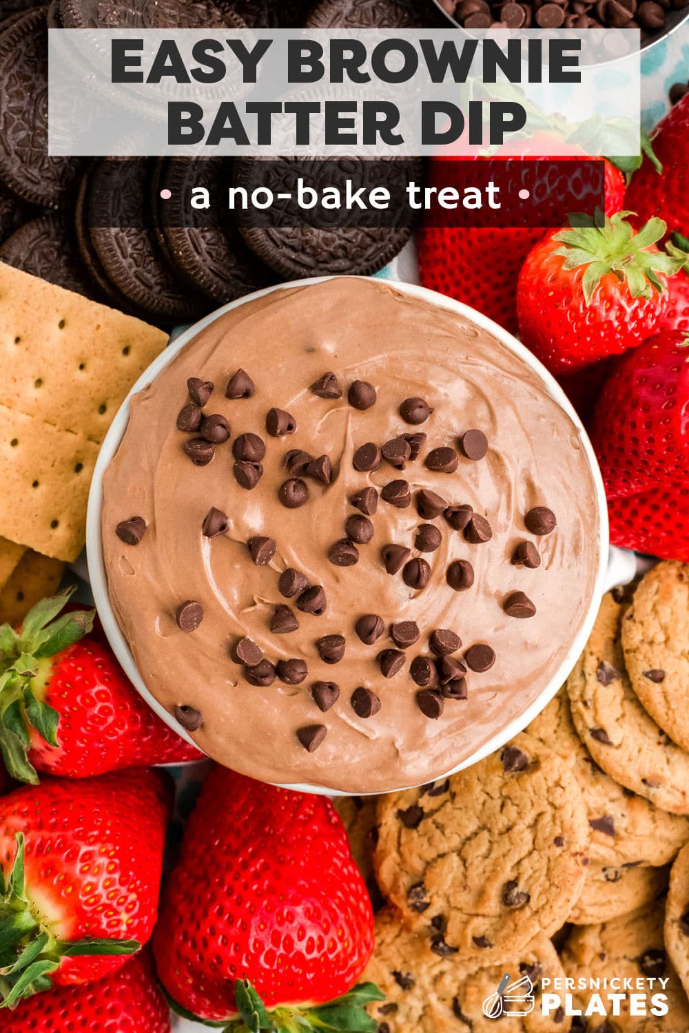 Easy brownie batter dip is the perfect dessert dip for your next family movie night or when you need a quick and easy chocolate craving fix! This no-bake dip is made in 10 minutes without any raw eggs and is creamy, luscious, and perfectly safe to eat. Serve with fresh fruit, cookies, pretzels, and any of your favorite dippers! | www.persnicketyplates.com