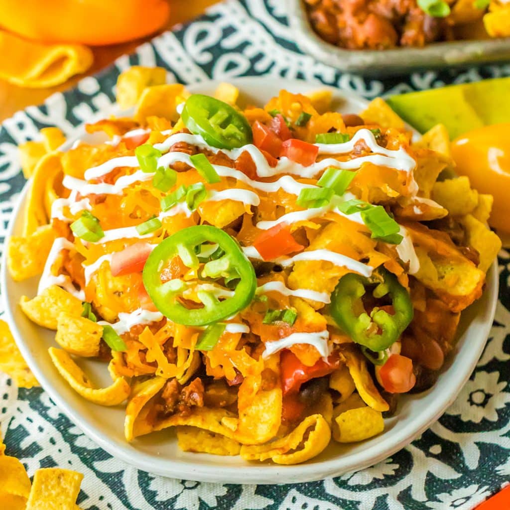overhead shot of frito chili pie topped with jalapeno slices.