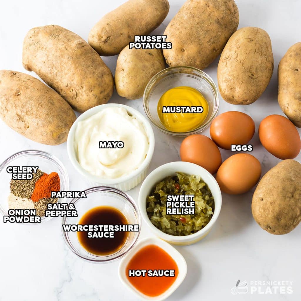 overhead shot of labeled ingredients laid out to make potato salad.