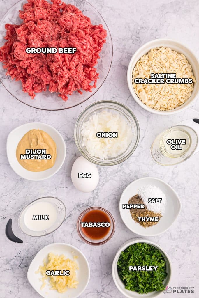 overhead shot of labeled ingredients laid out to make meatballs.