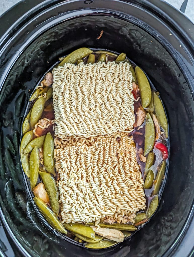 overhead shot of ramen noodles in a crockpot.