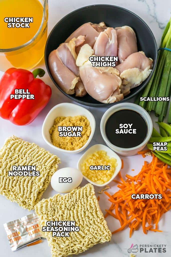 overhead shot of labeled ingredients laid out to make chicken ramen.