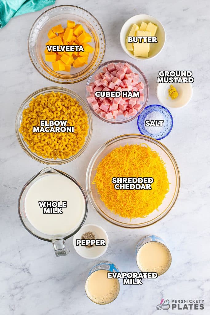 overhead shot of labeled ingredients laid out to make mac and cheese with ham.