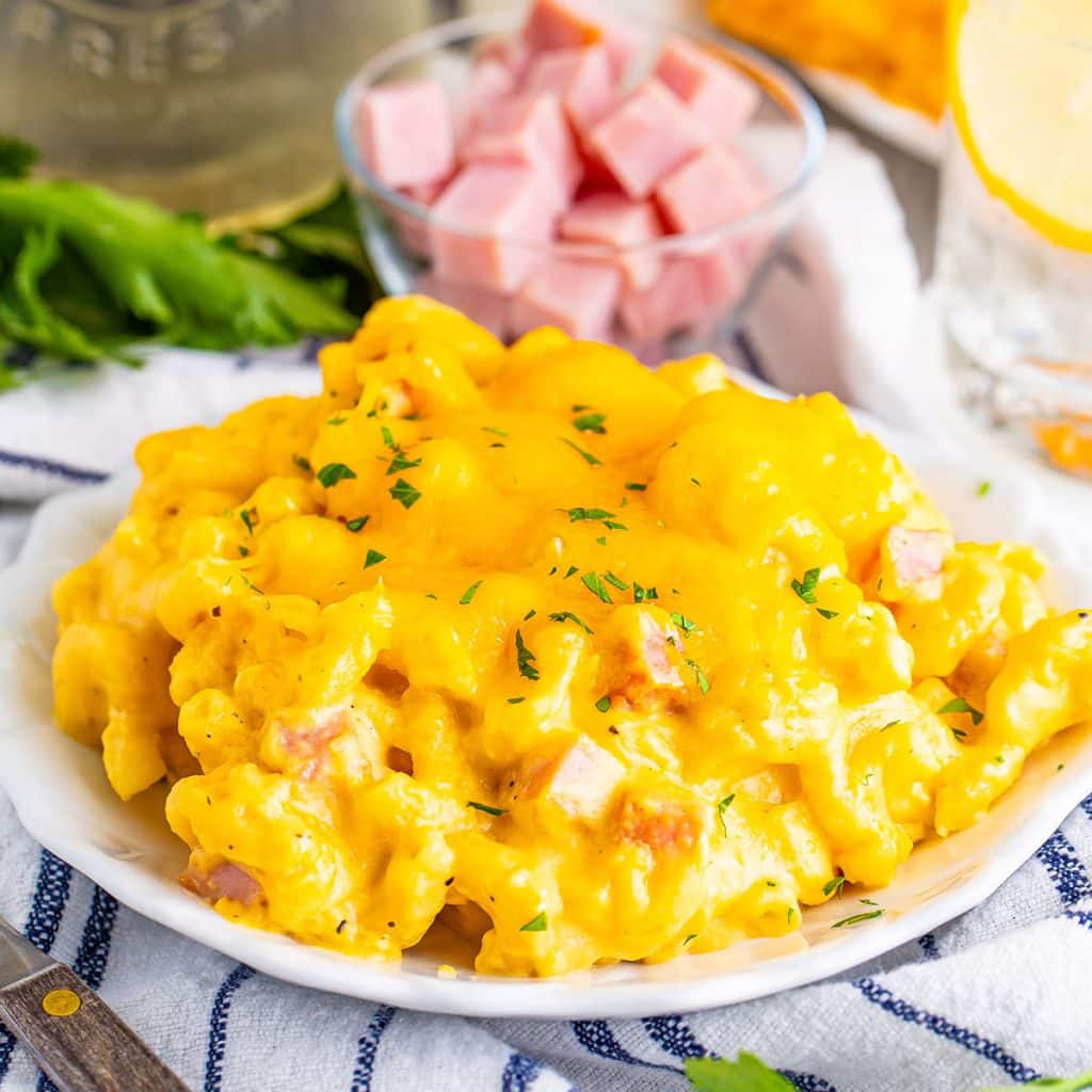 plate of mac and cheese with ham.