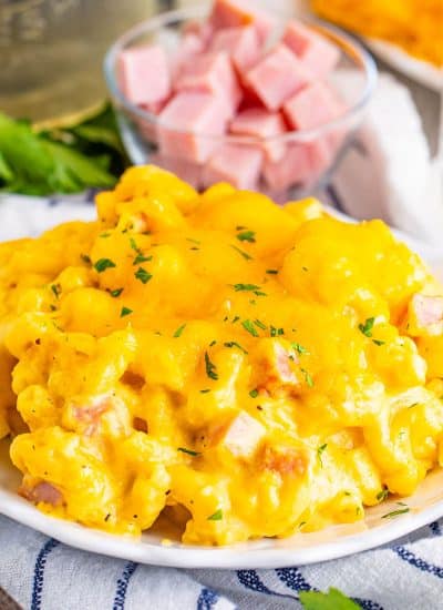 plate of mac and cheese with ham.