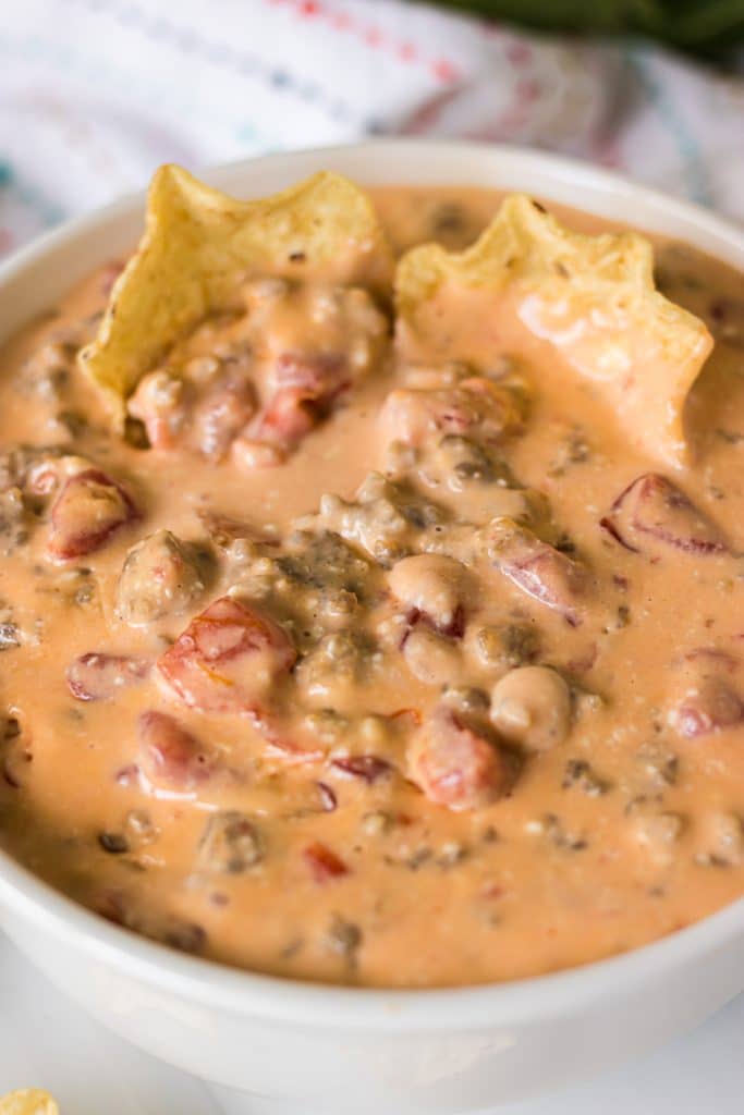 https://www.persnicketyplates.com/wp-content/uploads/2023/09/slow-cooker-sausage-cheese-dip-21-683x1024.jpg